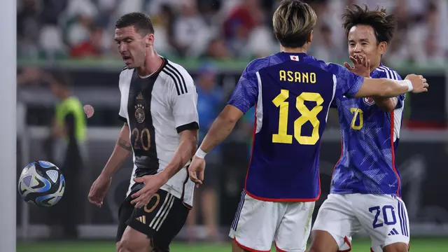 Selebrasi pemain Jepang ketika menjebol gawang Jerman di laga uji coba