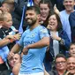 Ekspresi striker Manchester City, Sergio Aguero, usai mencetak gol ke gawang Huddersfield, Sabtu (19/8/2018).  (AFP / Lindsey Parnaby)