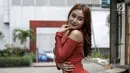 Pedangdut Pamela Safitri Duo Srigala berpose saat difoto di kawasan Jakarta, Jumat (2/3). Dalam kesempatan itu Pamela menceritakan tentang asuransi salah satu bagian tubuhnya. (Liputan6.com/Faizal Fanani)