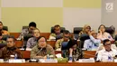 Menteri Keuangan Sri Mulyani, Menkumham Yasonna Laoly, Menteri PPN/Kepala Bappenas Bambang Brodjonegoro, dan Gubernur Bank Indonesia (BI) Perry Warjiyo saat rapat kerja dengan Banggar DPR, Jakarta, Selasa (4/9). (Liputan6.com/JohanTallo)