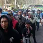 Para perantau asal Jawa Timur tiba di Bakorwil III Malang pada 2 Oktober 2019. Mereka pulang pasca kerusuhan Wamena (Liputan6.com/Zainul Arifin)