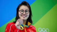 Perenang China, Fu Yuanhui, mengaku sedang haid saat mengikuti lomba renang di nomor estafet 4 x 100 meter di Olimpiade Rio 2016, Senin (15/8/2016). (Reuters/David Gray)