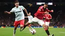 Hasil imbang membuat Manchester United dan Twente berada di papan tengah klasemen sementara League Phase Liga Europa 2024/2025. (Darren Staples/AFP)