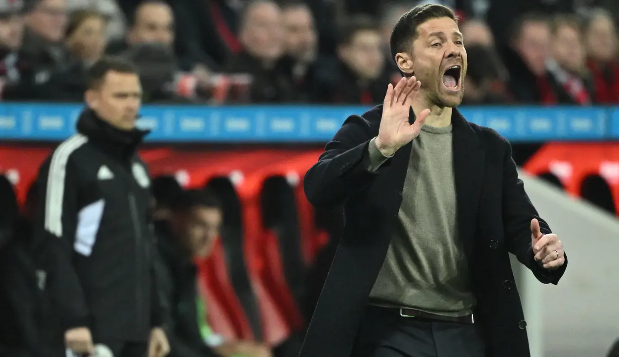 Di musim perdananya, Xabi Alonso berhasil membawa Leverkusen finish di peringkat enam klasemen akhir Bundesliga dari sebelumnya berada di peringkat 17.  (INA FASSBENDER / AFP)