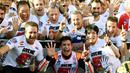 Pebalap Repsol Honda Team, Marc Marquez (tengah) berada pada urutan kedua Trending Riders dengan 32% total mention. (AFP/Toshifumi Kitamura)