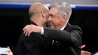 Pelatih Real Madrid, Carlo Ancelotti, menyindir Pep Guardiola yang mengeluhkan jadwal padat jelang leg 2 semifinal Liga Champions 2022/2023. (AFP/Javier Soriano)