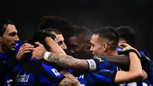 Para pemain Inter Milan merayakan gol yang dicetak Marcus Thuram ke gawang Udinese dalam laga giornata 15 Serie A Liga Italia 2023/2024 di Giuseppe Meazza, Milan, Minggu (10/12/2023) dini hari WIB. Inter Milan menang telak 4-0 dalam pertandingan ini (MARCO BERTORELLO / AFP)