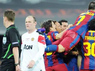 Para pemain Barcelona serentak bergembira usai mengalahkan Manchester United 3-1 pada partai final Liga Champions di Wembley Stadium, 28 Mei 2011. AFP PHOTO/FRANCK FIFE
