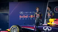 Sebastian Vettel tak khawatir jika harus bersaing dengan rekannya, Daniel Ricciardo (AFP/Jorge Guerrero)
