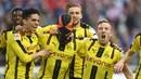 3. Venom (Borussia Dortmund) - Model topeng yang berbeda dipamerkan Aubameyang dipenghujung kariernya bersama Dortmund. Karakter Venom dipamerkan pemain binaan AC Milan tersebut saat berselebrasi. (AFP/Patrik Stollarz)
