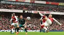 Gelandang Arsenal, Jack Wishere, berupaya melepas tendangan saat melawan Southampton pada laga Premier League di Stadion Emirates, London, Minggu (8/4/2018). Arsenal menang 3-2 atas Southampton. (AFP/Glyn Kirk)