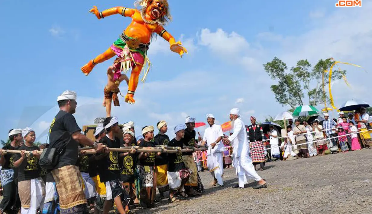 Dalam perwujudan patung, Bhuta Kala digambarkan sebagai sosok yang  besar dan menakutkan, biasanya dalam wujud raksasa (Liputan6.com/Andrian M Tunay). 