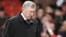 Manchester United manager Sir Alex Ferguson leaves the field after their 2-2- draw against FC Porto during their UEFA Champions League quarter final first leg football match at Old Trafford on April 7, 2009. AFP PHOTO/FRANCISCO LEONG 