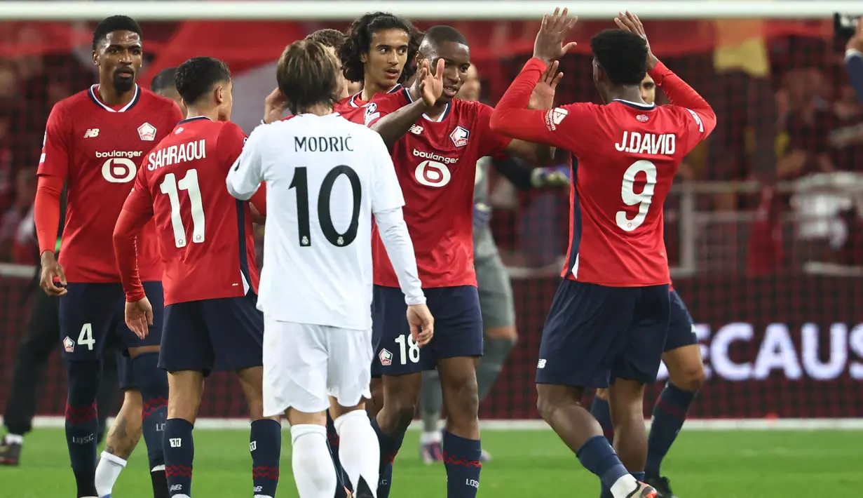 Bermain kandang, Lille sukses menekuk Real Madrid dengan skor 1-0. (Sameer Al-Doumy/AFP)