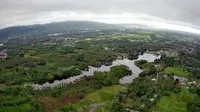 Pemandangan danau perintis Bonebol dari atas puncak tabuliti, Kecamatan Suwawa (Arfandi/Liputan6)