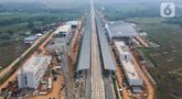 Foto udara memperlihatkan proyek Stasiun Karawang Kereta Cepat Jakarta-Bandung (KCJB), Kabupaten Karawang, Rabu (17/5/2023). (Liputan6.com/Herman Zakharia)