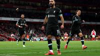 Mohamed Salah merayakan gol saat Liverpool bertandang ke markas Arsenal pada lanjutan Liga Inggris 2024/2025. (Adrian Dennis / AFP)
