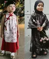 Lihat di sini beberapa potret gaya kontras tapi tetap menggemaskan dari Ameena yang pakai cheongsam dan gamis berhijab, mana favoritmu?