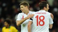 Frank Lampard dan Steven Gerrard usai laga persahabatan internasional antara Inggris vs Brasil di Stadion Wembley, London (6/2/2013). (EPA/Andy Rain).