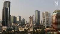 Gedung bertingkat mendominasi kawasan ibu kota Jakarta pada Selasa (30/7/2019). Badan Anggaran (Banggar) DPR bersama dengan pemerintah menyetujui target pertumbuhan ekonomi Indonesia berada di kisaran angka 5,2% pada 2019 atau melesat dari target awal 5,3%. (Liputan6.com/Angga Yuniar)