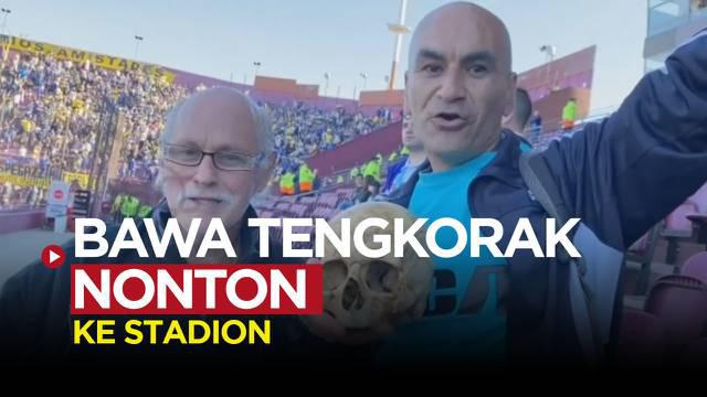 Berita video seorang fans Racing club membawa tengkorak kakeknya untuk menonton sepak bola di Argentina