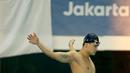 Perenang Singapura, Joseph Schooling, saat beraksi di nomor 100 meter gaya kupu-kupu putra pada Asian Games di Akuatik, GBK, Jakarta, Rabu (22/8/2018). Joseph Schooling sukses persembahkan medali emas pertama untuk Singapura. (Bola.com/Peksi Cahyo)