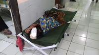 Atikah (40), seorang warga Sukabumi, Jawa Barat masih terbaring lemah di rumah sakit. Foto: (Mulvi Mohammad/Liputan6.com)