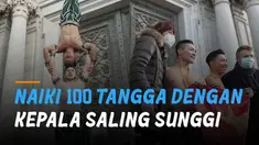 Rekor dunia didapatkan oleh kakak beradik ini ketika menaiki 100 anak tangga dengan kepala saling sunggi.