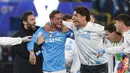Kemenangan ini sekaligus mengukuhkan dominasi Napoli sebagai salah satu kekuatan utama sepak bola Italia musim ini. Tampak dalam foto, para pemain Napoli merayakan kemenangan setelah memenangkan pertandingan final Piala Super Italia melawan Bologna di Stadion King Al-Awwal Park, Riyadh pada Senin 22 Desember 2025 malam waktu setempat. (Fayez NURELDINE/AFP)