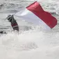 Aqsa Sutan Aswar melakukan selebrasi berhasil menyumbangkan medali emas Asian Games 2018 cabang olahraga Jetski di Pantai Ancol, Jakarta, Minggu (26/8/2018). (Bola.com/Vitalis Yogi Trisna)