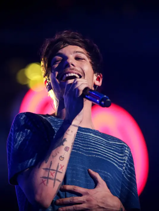 Louis Tomlinson telah menghabiskan waktunya dengan anak pertamanya Freddie Reign Tomlinson, yang kini berusia dua bulan. (AFP/Bintang.com)