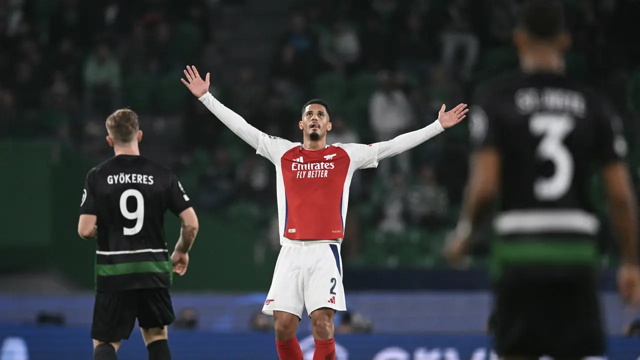 Selebrasi pemain Arsenal ketika mencukur Sporting di Liga Champions