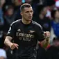 Gelandang Arsenal Granit Xhaka berselebrasi setelah mencetak gol pembuka untuk timnya ke gawang Southampton dalam pertandingan Liga Inggris di&nbsp;St Mary's Stadium, Southampton, Minggu, 23 Oktober 2022.&nbsp;(Ben Stansall / AFP)