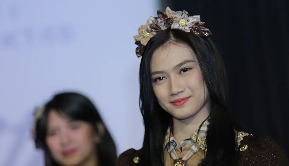 Melody JKT48 ternyata salah satu penggemar dari klub Manchester United. Jika ada waktu, Melody akan berusaha untuk menonton tim kesayangannya itu. (Adrian Putra/Bintang.com)