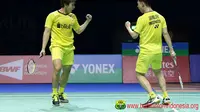 Kevin Sanjaya Sukamuljo/Marcus Fernaldi Gideon mengalahkan ganda kuat China, Liu Cheng/Zhang Nan, dalam dua gim langsung, 21-16, 21-15, pada final BWF Super Series Finals 2017, Minggu (17/12/2017). (PBSI)