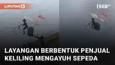 Sebuah layangan memiliki bentuk beda dari yang lain menarik perhatian