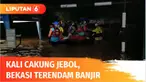 Ratusan rumah di Perumahan Bumi Nasio Indah, Jati Asih, Kota Bekasi, Jawa Barat, terendam banjir. Ketinggian air yang mencapai 1 meter lebih membuat sejumlah warga terpaksa dievakuasi lantaran ketinggian air terus meninggi.