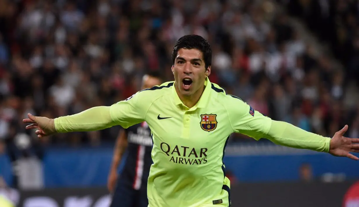 Ekspresi Luis Suarez setelah mencetak gol ketiga Barcelona dalam lanjutan babak perempatfinal Liga Champion di Stadion Parc des Princes, Paris, Perancis. Rabu (15/4). Barcelona unggul 3-1 dalam pertandingan itu