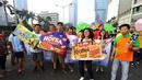 Orang Tua Group turut serta dalam Parade Simpatik Hari Pelanggan Nasional 2014 di Jakarta,  Minggu (7/9/14). (Liputan6.com/Johan Tallo)