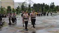 Kapolresta Pekanbaru Kombes Jeki Rahmat Mustika usai memimpin apel gelar pasukan pengamanan Pemilu 2024. (Liputan6.com/M Syukur)