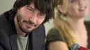 Keanu Reeves membuktikan jika poni tak hanya dapat dimiliki oleh kaum wanita saja. (Bintang/EPA)