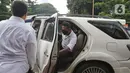 Musikus I Gede Ary Astina alias Jerinx tiba di Polda Metro Jaya, Jakarta, Sabtu (14/08/2021).  Kedatangan Jerinx untuk menghadiri proses mediasi dengan pegiat media sosial Adam Deni Toba dalam menyelesaikan kasus dugaan pengancaman yang menjeratnya. (Liputan6.com/Herman Zakharia)