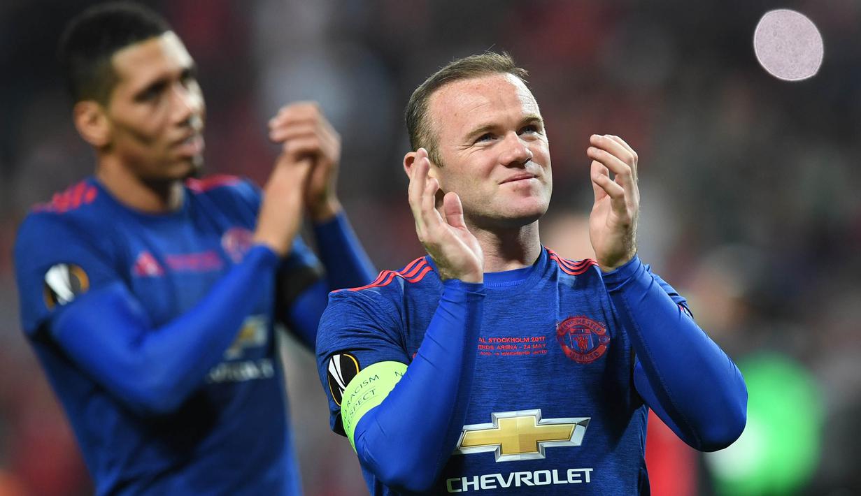 Sebanyak 15 gelar juara mulai dari trofi Premier League hingga Liga Champions pernah diraih Wayne Rooney. (AFP/Paul Ellis)