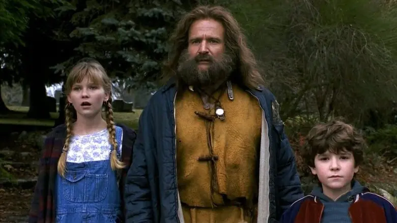 Kirsten Dunst (kiri) di film Jumanji di tahun 1995 bersama Robin Williams. (Indiwire)