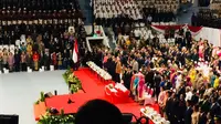 Presiden Joko Widodo atau Jokowi memimpin upacara peringatan HUT ke-72 Bhayangkara di Istora Senayan, Jakarta (Merdeka.com/ Titin Supriatin)