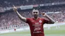 Striker Persija Jakarta, Marko Simic, melakukan selebrasi usai membobol gawang Borneo FC pada laga Shopee Liga 1 di SUGBK, Jakarta, Minggu, (1/3/2020). Persija menang 3-2 atas Borneo FC. (Bola.com/M Iqbal Ichsan)