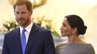 Meghan Markle dan Pangeran Harry (AP Photo)