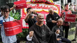 Aksi tersebut sebagai dukungan kepada kepolisian untuk terus mengungkap kasus terkait dugaan pemerasan oleh Ketua KPK Firli Bahuri terhadap mantan Menteri Pertanian Syahrul Yasin Limpo. (Liputan6.com/Faizal Fanani)