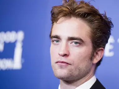 Aktor Robert Pattinson akhirnya sukses berpindah hati ke wanita lain. (AFP PHOTO/Robyn Beck)