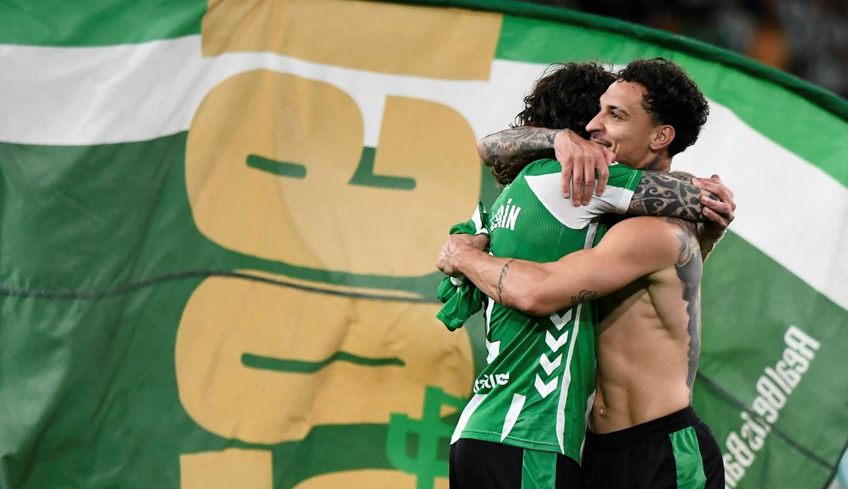 Real Betis sukses mengamankan satu tempat di Liga Champions musim depan setelah mengalahkan Elche dengan skor 2-1 di Estadio de La Cartuja pada Rabu (13/5/2026) dini hari WIB. (AFP/Cristina Quicler)